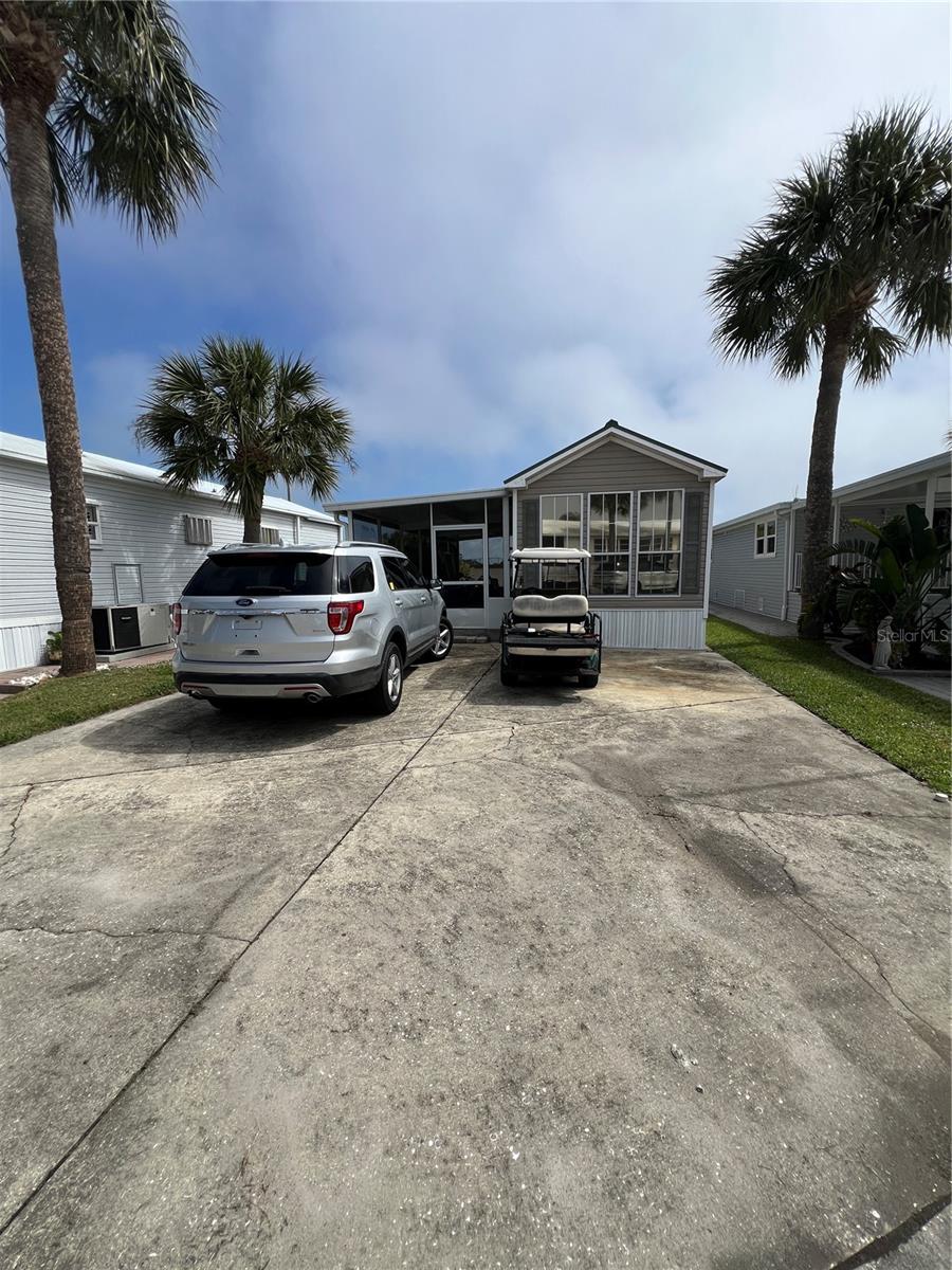 ~Ancient Oaks~ 55+ gated Community. 1 B 1B 2006 Chariot. Metal Roof New AC 2022. New flooring throughout. Huge screened in patio, very private backyard! Furnished, Double street- lots of parking for your boat! All measurements are approximate.