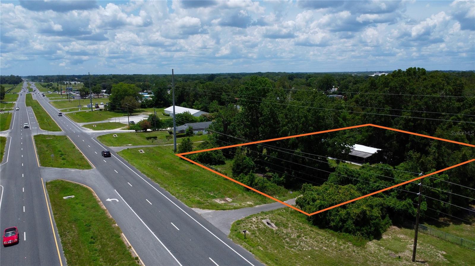 Located with 175' of frontage and high visibility on Highway 40 (24,500+ AADT) and under 1.5 miles (4-minute drive) from the World Equestrian Center. This commercial parcel is perfect for a business ready to be exposed to high traffic counts, especially one related to the equestrian scene. Nearby businesses include TT Distributors (horse/farrier supplies), J&J Tack Shop, Public Storage, and several auto shops.