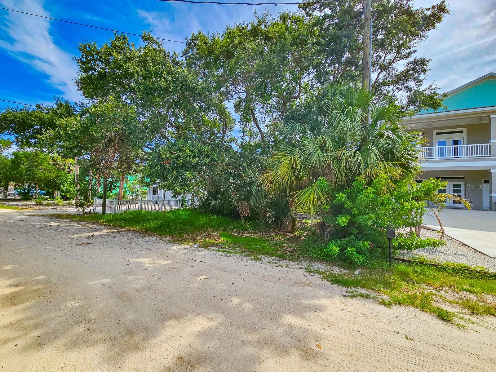 Peaceful Beachside Living Awaits! This approximately 50' x 175' vacant lot offers a quiet setting just four blocks from the ocean in Flagler Beach’s laid-back south end. Nestled on a low-traffic, unimproved road, this homesite is ideal for those seeking a more relaxed, tucked-away coastal lifestyle. Public beach access is conveniently located at 27th Street, and golf cart access is allowed throughout the neighborhood. There are few remaining opportunities to build new in this charming beachside community. Just blocks from downtown shops and restaurants, and minutes from the Intracoastal Waterway, parks, and scenic nature trails. With I-95 just 3 miles away, this location offers quick drives to historic St. Augustine, Daytona Beach, and Orlando. Vacant lots this close to the beach are becoming increasingly rare—secure your piece of paradise today! Signed and sealed construction documents (CDs) are available. See listing documents.