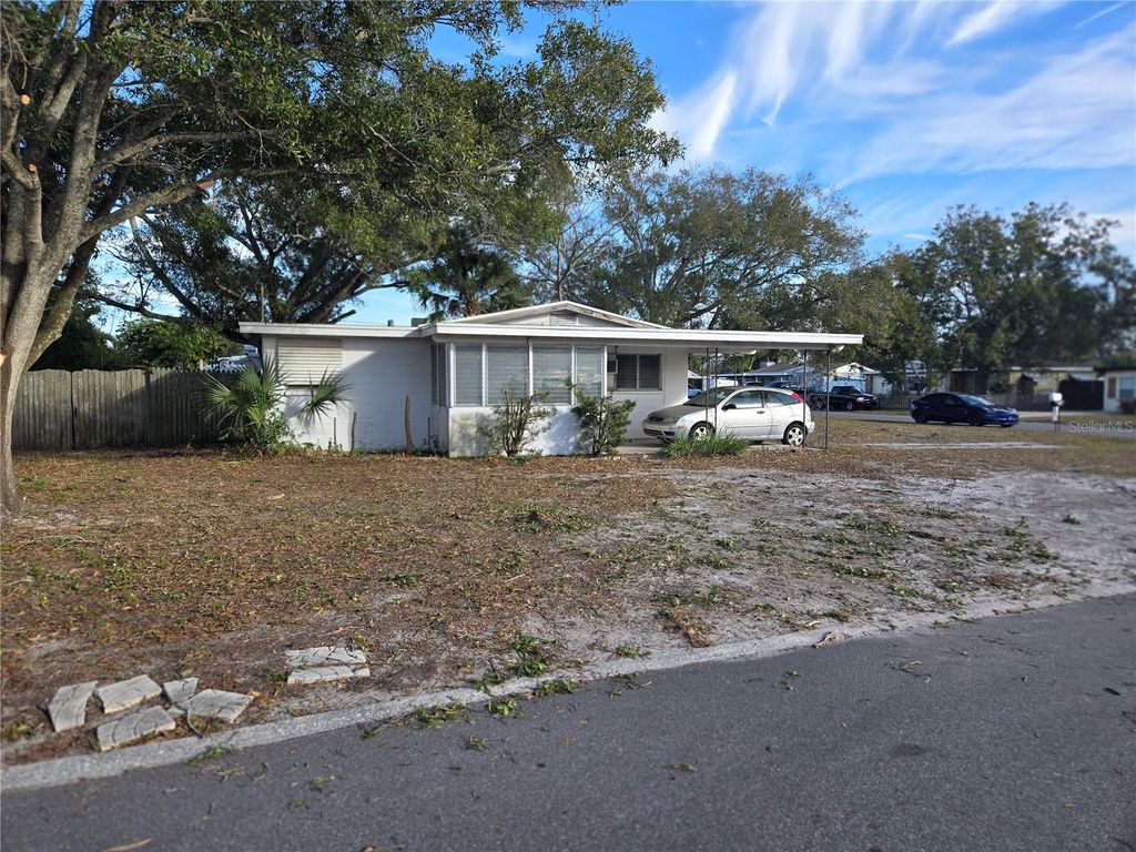 Photo of 5052 Jasmine Circle, St Petersburg, FL 33714 (MLS # TB8462166)