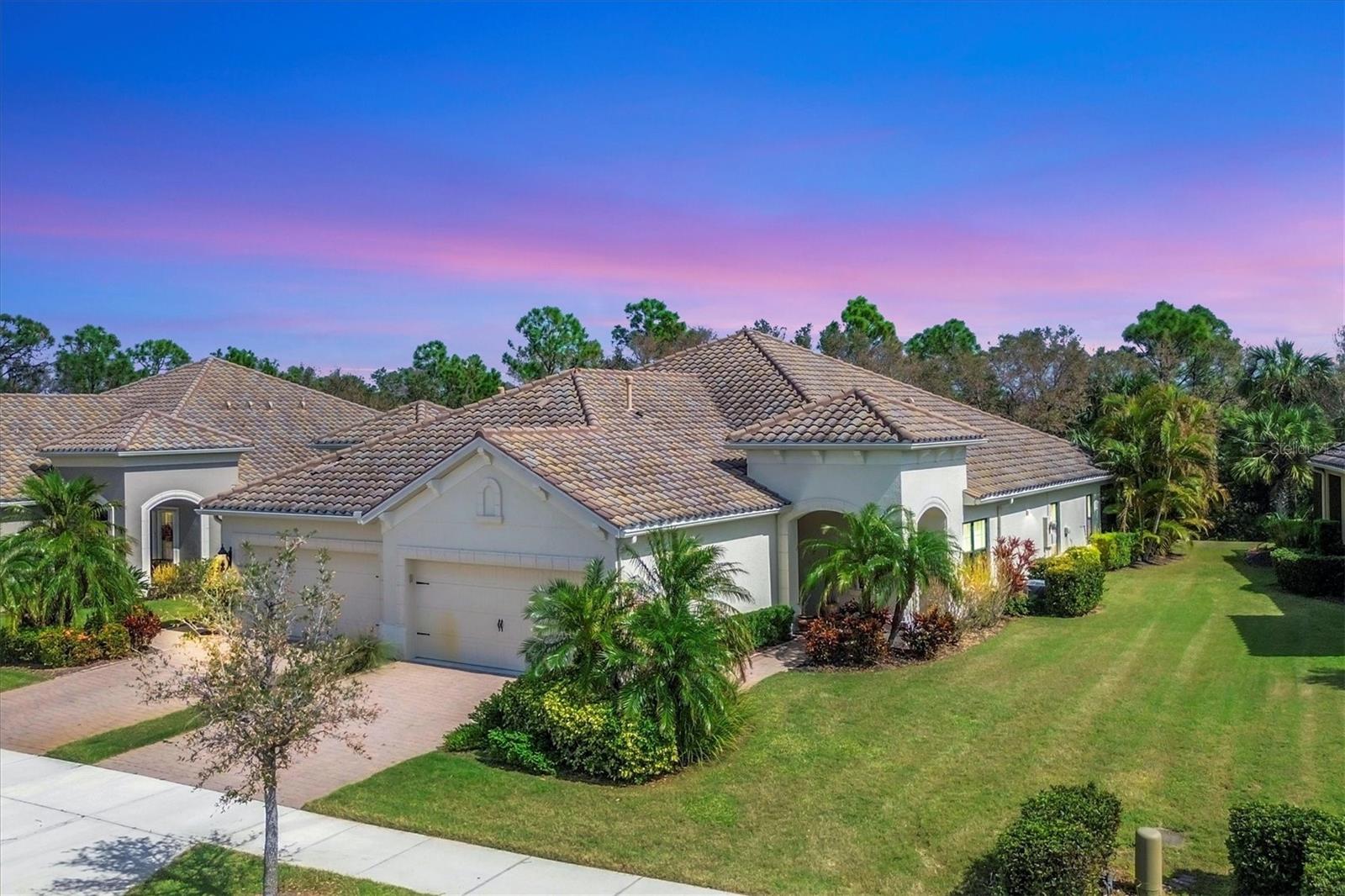 Welcome to your dream retreat in the exceptional gated Grand Palm community! This spacious, maintenance-free 2-bedroom, 2-bath home with a versatile den combines comfort and convenience. Step into an open and inviting layout featuring a gourmet kitchen with Corian countertops, high vaulted ceilings, and a great room perfect for entertaining. The main living areas and bathrooms showcase elegant tile floors, while luxury vinyl adds warmth to the bedrooms and den.
Enjoy your mornings or evenings on the expansive, screened-in lanai overlooking the lush surroundings. Fully furnished, this home is move-in ready for you to start enjoying immediately.
Beyond your doorstep, Grand Palm offers an impressive array of resort-style amenities. With two clubhouses, a resort-style pool, lap pool, spa, fitness center, and gathering hall, there's something for everyone. Sports enthusiasts can enjoy tennis, pickleball, and miles of scenic walking trails, while the pier offers a peaceful spot for fishing. A playground, dog park, and numerous other recreational spaces make this community truly unique. Experience the best in maintenance-free living at Grand Palm!