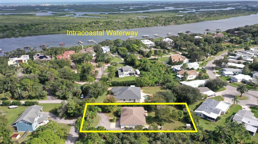 Looking for space to park boats, trailers, or an RV in a wonderful Intracoastal frontage community? That is what you have here in this very desirable, quiet community where this home is one of only a few that are not on the water. The home sits on over a half acre with plenty of parking including a 2 car garage. One side is deep measuring 46' x 11' allowing you to park a boat or have a nice workshop. RV hookup on the right side of the home so you can stop paying storage fees. The custom home has many nice features as well! Cathedral ceilings, fiberglass exterior doors, outdoor shower, large open floor plan, fireplace, generator hookup, hurricane shutters, SAFE ROOM which doubles as the second bathroom consisting of block walls and concrete a ceiling, indoor laundry room, and a spacious kitchen with lots of cabinets. HVAC replaced in Oct 2020 and appliances are 2017. Located in Flood Zone X! Come experience this wonderful opportunity today! Several Pictures are virtually staged. ;Water: City