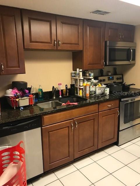 GARDENS OF FOREST LAKES CONDO THE - Residential Lease