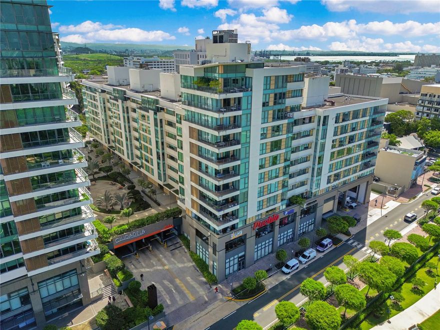 Experience elevated urban living in this fully remodeled 2-bedroom, 2.5-bathroom apartment located in the well-established Condominio Torre del Norte in Ciudadela. Designed with upscale modern finishes throughout, this residence offers an open-concept layout complemented by breathtaking panoramic views of the city skyline, Santurce Park, and the ocean.

The expansive living and dining areas flow effortlessly into a designer kitchen featuring a large quartz island, sleek cabinetry, and premium finishes—ideal for both entertaining and everyday living. The primary suite boasts a custom walk-in closet with a modern, boutique-style design, creating a refined and highly functional private retreat.

The laundry area has been thoughtfully designed with built-in countertops and a utility sink, adding convenience and practicality without compromising style. Once completed, the apartment will feature a Sonos sound system installed in all bedrooms and the primary bathroom, creating an immersive audio experience throughout the residence. Additionally, custom furniture from Restoration Hardware is currently on order, further elevating the sophistication and comfort of the space.

Living in Ciudadela means enjoying a true urban lifestyle with resort-style comforts, including a swimming pool, 24/7 security, and a full backup electric generator providing power to the entire unit. Walkable access to dining, shopping, green spaces, and cultural venues completes this exceptional opportunity for upscale city living.