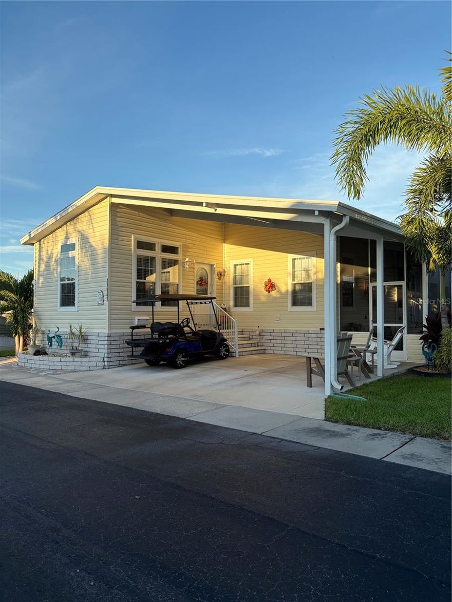 Nestled within a welcoming 55+ waterfront community, this 2020 Jacobsen-built manufactured home combines modern comfort with resort-style living. Offering 2 bedrooms and 2 full baths, the home features a spacious kitchen with a walk-in pantry, abundant storage, and a separate laundry room. The screened-in lanai is perfect for enjoying the tranquil surroundings, while the 2-car carport provides convenience. Beautifully maintained landscaping and numerous upgraded features make this home truly move-in ready. Beyond the doorstep, residents enjoy an active lifestyle with amenities such as a heated lap pool, hot tub, and shuffleboard courts—all set against the backdrop of peaceful waterfront views. This is a place where relaxation meets community, and every day feels like a retreat. Golf Cart negotiable. PRICE INCLUDES $55,000 SHARE!