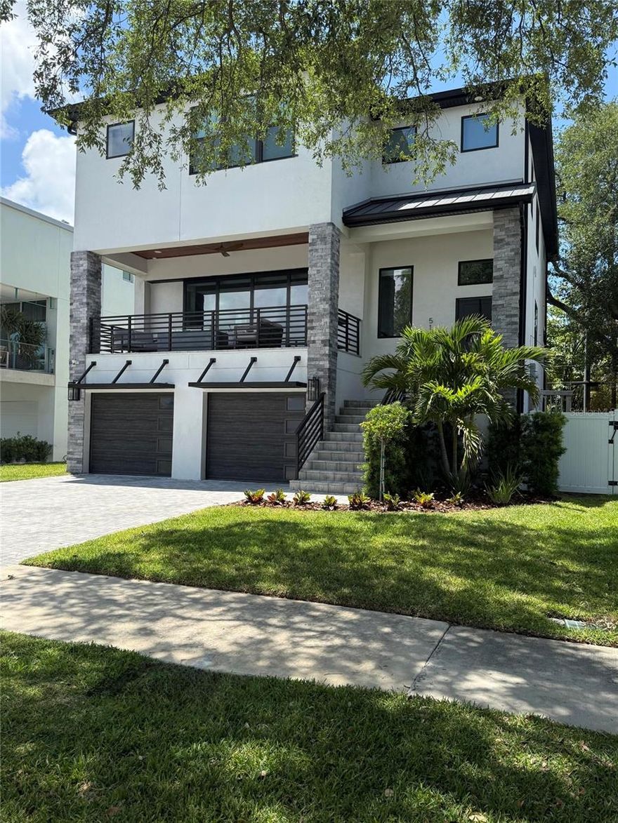 Under contract-accepting backup offers. 510 Channel Drive provides Davis Islands luxury waterfront living with amazing water views, a resort-style pool and hot tub, and exceptional indoor-outdoor space. Custom built in 2022, this 5-bedroom, 5-bath home features an open, light-filled layout with 10-foot main-level ceilings, high-end finishes, professional-grade appliances, custom cabinetry, and a walk-in temperature-controlled wine room.

Enjoy the water view and beautiful sunrises from the large east-facing balcony, with the unique Davis Islands backdrop of boats, cruise ships, and dolphins passing through Tampa Bay. Watch the University crew team row past or host a Gasparilla invasion party in your front yard.

Entertain in the beautiful kitchen, anchored by the 6-seat island with prep sink and beverage fridge. Storage abounds in the walk-in pantry with custom shelving. Grab a bottle of wine from your 500  plus bottle wine room. Take a dip in the backyard pool or relax in the hot tub while you watch the poolside TV.

This floor plan provides space for family and guests and includes a home office. Each bedroom has its own full bath with custom finishes. The master boasts His and Hers walk-in custom closets and overlooks the water. Functionality is everywhere, including the two laundry rooms: one upstairs, one down. The 1800 square foot garage can accommodate up to 8 cars and includes a storage closet and gym area. Located on sought-after Channel Drive, the home is walkable to Davis Islands Village and is close to Tampa General Hospital, Bayshore Boulevard, downtown Tampa, Hyde Park, Water Street, and the Davis Islands Yacht Club.

Come see this rare opportunity to own a luxury home with water views, outdoor living, and the Davis Islands lifestyle.