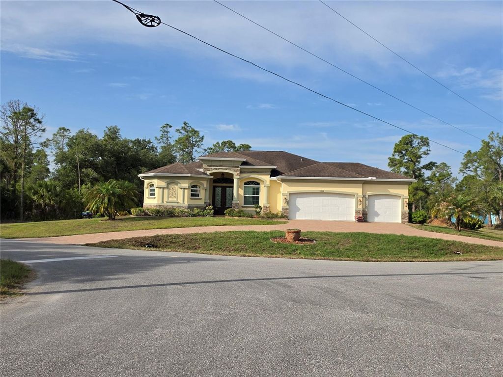 Photo of 1193 Hammacher Lane, Port Charlotte, FL 33953 (MLS # C7526109)
