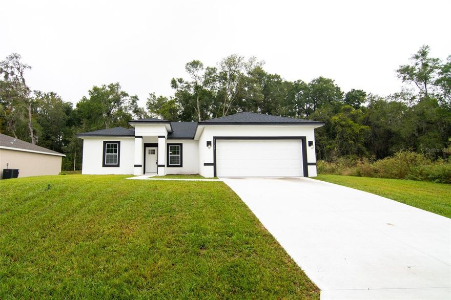 Brand-New Construction • 4 Bedrooms • 2 Bathrooms • Marion Oaks, Ocala.
Beautifully designed home located just minutes from I-75, shopping, restaurants, schools, and all essential amenities.
Open-concept floor plan filled with natural light. The contemporary kitchen features white cabinets, quartz countertops, stainless steel appliances, and a spacious island. The living and dining areas flow seamlessly, creating a warm and welcoming atmosphere.
The split-bedroom layout offers privacy, with a comfortable primary suite that includes two walk-in closets and an elegant ensuite bathroom with dual sinks, walk-in shower and a soaking bathtub. 
Outside, enjoy a generous lot with plenty of privacy and space for entertaining, gardening, or simply relaxing.

Financing Incentives: 100% financing available (for qualified buyers) and a $10,000 seller credit toward buyer’s closing costs, prepaids, and other lender-approved fees.

Don’t miss your chance to make this house your home.

(All information provided is deemed reliable, but is not guaranteed and should be verified by buyers and their agents.)