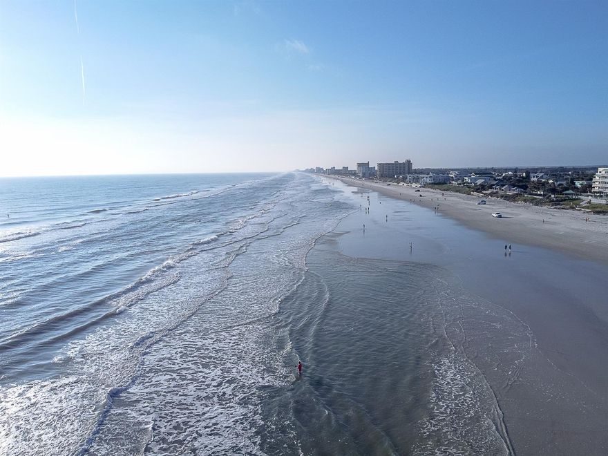 Are you ready to wake up to Beautiful New Smyrna Beach sunrises? Well here is your chance whether your looking for a second home as a vacation home or maybe just wanting to live on the Beach forever. This condo has been totally remodeled new flooring new cabinets new appliances all new bathroom shower with glass doors and luxury glass tiles! The unit is the second to last floor so your view is unbelievable off your direct ocean front balcony. You also overlook both pools court yard area Tiki hut and much much more. There is a exercise room and a club house and indoor laundry. The pool bar has beer and wine and dose daily activities all summer long. Did I mention only steps to Flagler Ave.  Can be rented daily maximizing your return if your an investor. So much more to offer its a must see!

Square footage received from tax rolls. All information recorded in the MLS intended to be accurate but cannot be guaranteed. ;Water: City