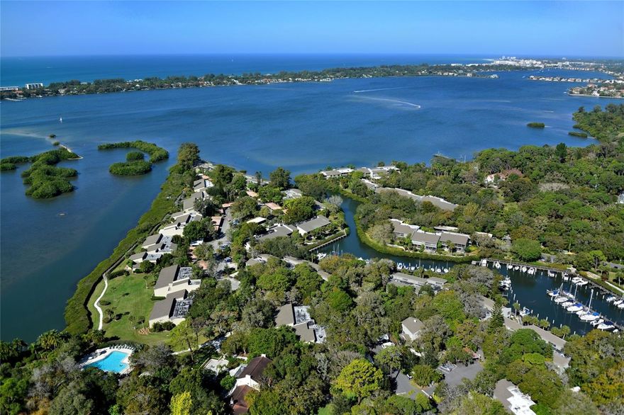 ***AVAILABLE JUNE 1, 2026 THROUGH NOVEMBER 30, 2026*** TURN KEY FURNISHED...Wait until you see the view of the bay, amazing birds flying, fish jumping and the boats are all fantastic to watch from the privacy of your home. Located near the swimming pool, this 3 bedroom, 2 bath condo has the room to entertain or for family stop in for a few days. Pelican Cove is a gated community abounding with amenities, including a low cost 86-slip boat harbor, kayak and canoe launch, six heated swimming pools, hot tub, three clubhouses with walking trails, boardwalks and fishing gazebos.  Take a class at Pelican Cove University or in yoga, tai-chi, water aerobics, painting or photography. Join one of the more than 37 clubs or photography, fiber arts, cycling, culinary arts, bridge, film and more. Or you can just relax at the evening jazz and classical music concerts, including concerts held harborside. Located on the lush grounds of the former Wilbanks Estate, Pelican Cove is hidden away yet minutes from everything! Come see for yourself!