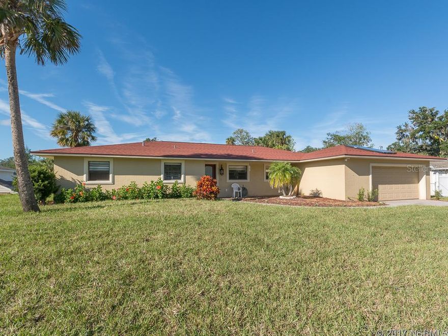 ATTENTION BOAT LOVERS!!!  HOME ON CANAL WITH ACCESS TO ICW WITH CONCRETE SEAWALL.  POOL.  NEW GRASS SOD AND SPRINKLER SYSTEM WITH ITS OWN WELL AND PUMP.  NEW SOLAR PANEL HOT WATER HEATER.  GRANITE COUNTERTOPS AND BUILT IN WINE COOLER.  200 SQ. FT. ENCLOSED PORCH WITH TILE FLOOR.1/2 BATH IN GARAGE ;Water: City