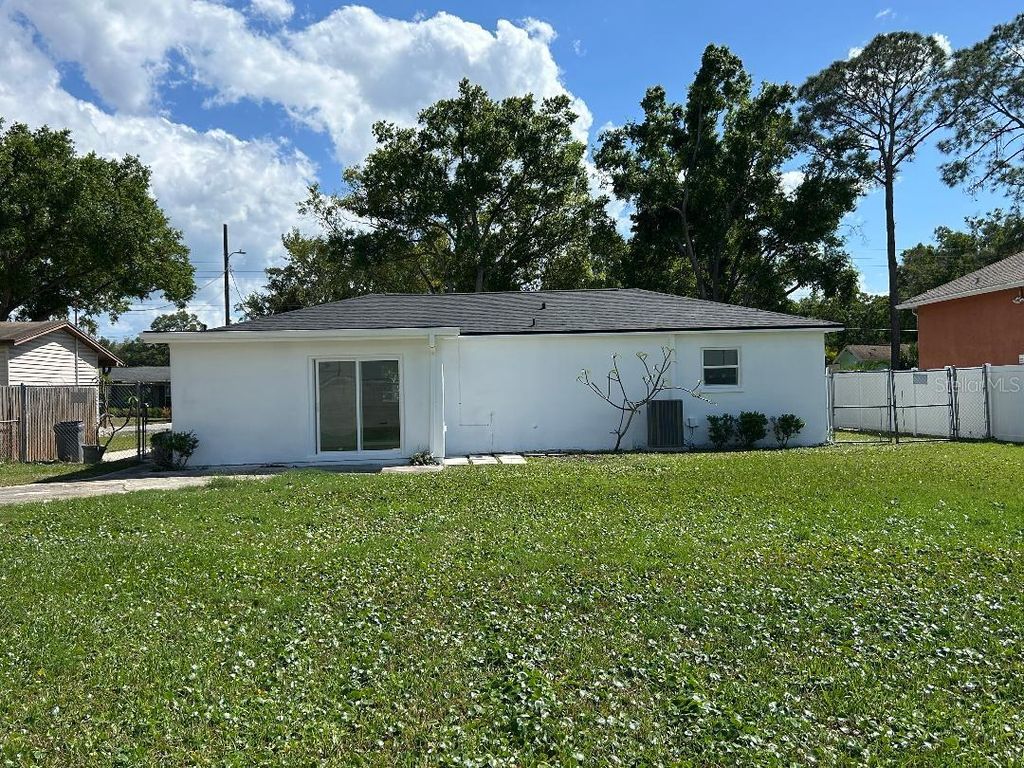Photo of 4611 W Mcelroy Avenue, Tampa, FL 33611 (MLS # TB8494034)