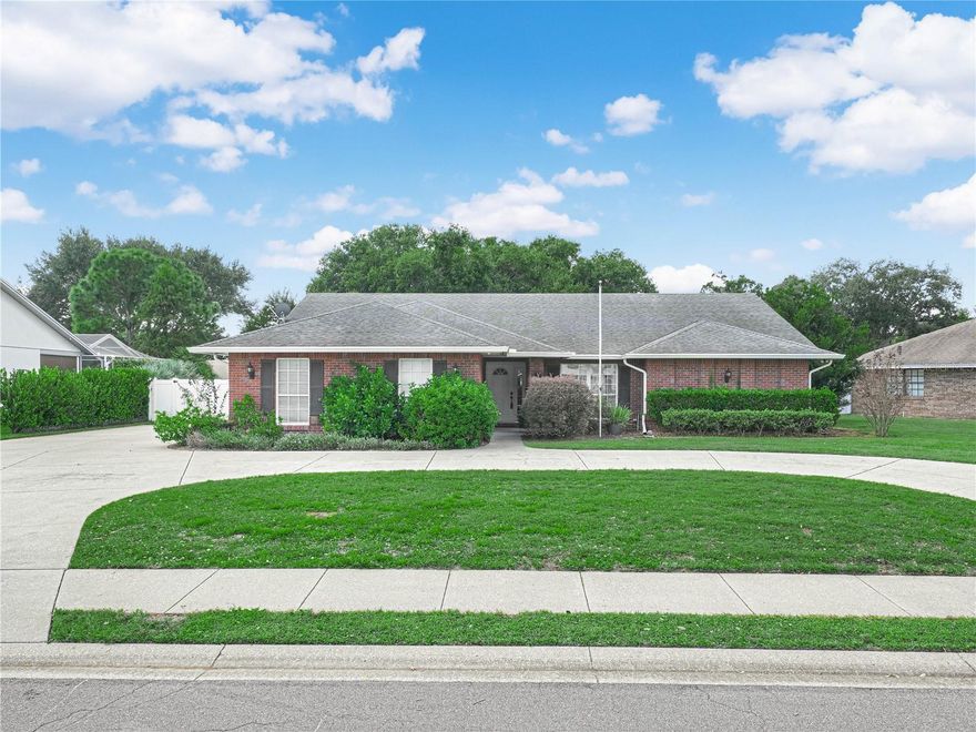 CIRCULAR DRIVE PAVES THE WAY TO YOUR NEW HOME! 3 bedroom 2 bath home with 2318 SF of living area located in desirable Bloomfield Hills, a place with neighbors that politely wave to each other. Meandering sidewalks take you through subdivision with walking path, tennis court, basketball court/pickleball court. Majestic trees line street, perfect for a bike ride. Enter home with tile foyer and coat closet. Central family room has vaulted ceilings with center beam and built in space for your TV. Cherry laminate floors throughout. AT YOUR SERVICE! Style and speed for the homeowner who does more than cook all day. Come home and prepare meals quickly and efficiently in this functionally designed kitchen. Pass through window opens to Florida Room. Decorative tile backsplash, corian countertops, stainless steel appliances and closet pantry. Snack bar that serves additional guest or perfect place for afternoon homework. Room for you china cabinet in formal dining room with large picture window that overlooks front yard. 12'x 30' FLORIDA ROOM with wall to wall windows that overlooks backyard and brings nature light inside. Perfect place for morning coffee or afternoon tea. MASTER SUITE with private sliding glass doors to Florida Room and large master bath. His/Her sinks promotes harmony with busy morning rush. Separate his/her walk in closets. Split bedroom plan with 2nd bath with door that opens to Florida Room ready for future pool or guest. Both 2nd and 3rd bedrooms feature walk in closets. Open brick paved patio overlooks vinyl fenced backyard, ready for outdoor BBQ. Side entry garage has enclosed storage room. Extended driveway can be used to extend to future detach garage. Call now for details!