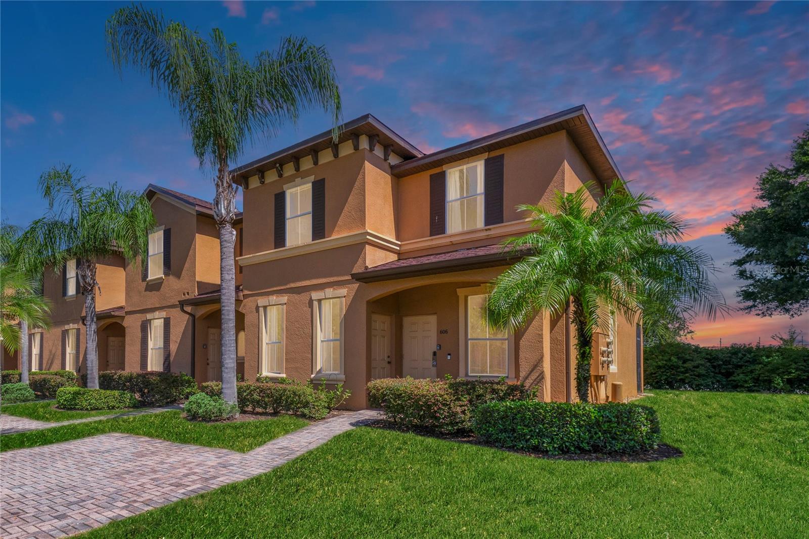 Step into this beautiful FULLY FURNISHED and UPDATED END-UNIT townhome in the highly sought-after Regal Palms Resort & Spa—a perfect fit for vacationers, investors, or full-time Florida living! This upgraded home sets itself apart with brand-new flooring throughout the main living areas and bedrooms, stylish NEW FURNITURE in every room, and two private SCREENED-IN SPACES—a patio off the first floor and a balcony off the upstairs primary suite. The layout includes dual primary suites, with one on the main floor ideal for multi-generational stays or maximizing rental income as a private lockout.
Located in a resort-style, GUARD-GATED community, ownership includes access to a wealth of amenities like a tropical pool complex with lazy river and waterslide, full-service spa, fitness center, on-site restaurant and tiki bar, arcade, volleyball courts, and playground. HOA covers cable and wifi, valet trash service, exterior maintenance, landscaping, and pest control - giving you a truly turn-key experience!
Nestled next to Highlands Reserve Golf Club and just a short drive from Disney, Universal, SeaWorld, and other Orlando attractions, this home is perfect as a short-term rental, vacation getaway, or full-time residence. Why just visit paradise when you can own it?