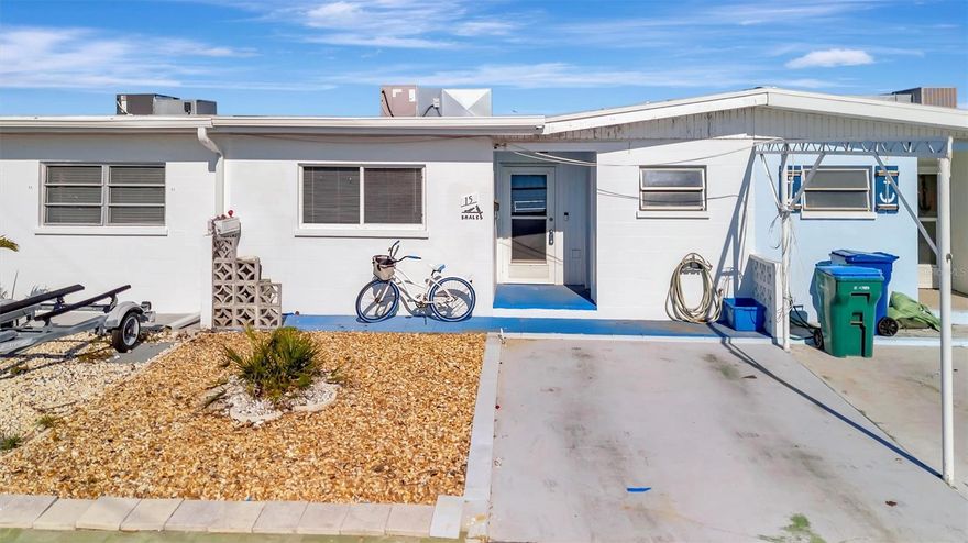 Waterfront Investor Opportunity on Anna Maria Island! This is your chance to create a boater’s paradise in the transformative Seaside Gardens of Holmes Beach. With direct access to the Gulf and no bridges, this property offers abundant dock space, making it a dream for water enthusiasts. 2020 Sea Wall with transferrable 60 YEAR WARRANTY!!! Just half a mile from the sugar-sand beaches, you’ll spend your days soaking up the sun and taking in breathtaking sunrises. The vibrant heart of Holmes Beach is just moments away, with charming restaurants, lively bars, cozy coffee shops, and a marina all within easy reach. Right off the property, you’ll find tennis, pickleball, and basketball courts, along with a nearby boat launch for effortless water access. Whether you choose to build your custom waterfront retreat with stunning views of Watson’s Bayou or renovate the existing structure to maximize value, this property offers endless possibilities. With strong short-term rental potential in this sought-after location, this is an excellent opportunity to secure your slice of paradise. Make your move before someone else does!