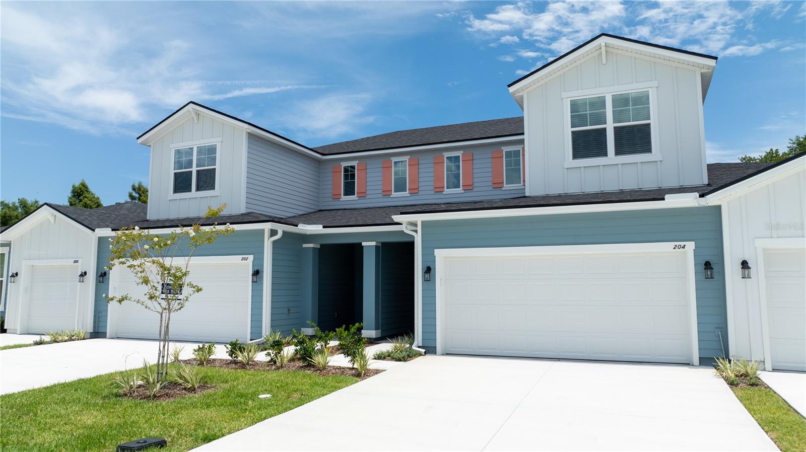 Welcome to The Hammock at Palm Harbor—a gated community where coastal charm meets modern luxury. This brand new, two-story townhome offers 1,853 square feet of open-concept living with 3 bedrooms, 2.5 bathrooms, and a spacious loft, ideal for a home office or flexible living space. The first-floor master’s suite provides comfort and privacy, while the two-car garage offers ample storage. Inside, enjoy wood-look tile flooring, a gourmet kitchen with quartz countertops, stainless steel appliances, and a custom tile backsplash. High-end details like iron spindle stair railings and a tray ceiling in the loft add a elegant touch. Outside, the community offers amenities, including a clubhouse with a sparkling pool, hot tub, and party kitchen—ideal for relaxing or entertaining. Located minutes from the Intracoastal Waterway, golf courses, beaches, shopping, and dining. Don’t miss this opportunity to enjoy low-maintenance, coastal living in one of Palm Coast’s most desirable neighborhoods.