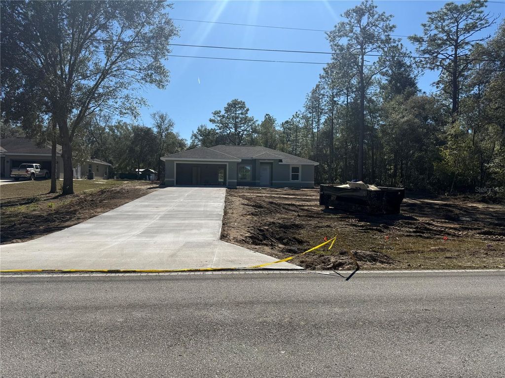 Photo of 20500 SW 54th Street, Dunnellon, FL 34431 (MLS # OM717309)