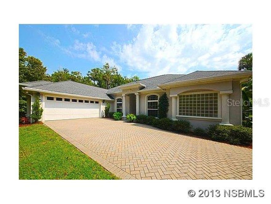 A MUST SEE! Lovely executive, custom built home on Lake Waterford. Gated community. Private, pavered driveway up to this beautiful residence. Open floor plan with an excellent view of the private pool and lake. Private, lighted dock. 12' ceilings in the living room and 10' throughout the remainder of the home. Built-ins throughout. Formal living room and den/office area. Kitchen is open to be able to view the lake with breakfast nook with window seating. Stainless steel appliances (Kitchen Aid, tile back splash with granite counter tops. Large Master suite consists of a Jacuzzi tub, shower, his and her closets and sinks. Master bedroom has three large windows to take in the views. Wood, carpet and tile throughout. Living room has tray ceilings and crown molding throughout the home. Separate washer and dryer area with wash tub and pantry. Surround sound throughout. Jack and Jill bathroom to connect the second and third bedrooms. Split plan. Pool bath. Pool is self cleaning, with three fountains and chlorinated. 3' to 5' deep. Solar equipment available, if buyer wanted to connect it. Covered lanai area off kitchen and living room. Pest tubes throughout home, treated monthly. All blinds included in sale. New A/C installed 10/2013. Detached Workshop - 16x12 and 10x12 Utility Shed.  Over sized two car garage and pull down attic. Lots of mature landscaping to keep your home very private. Community boat ramp, tennis court, and clubhouse. The lake is great for fishing, skiing/wake boarding and boating. 1.2 +/- cleared vacant lot available for purchase too, which would provide close to 3 acres on Lake Waterford ;Water: City