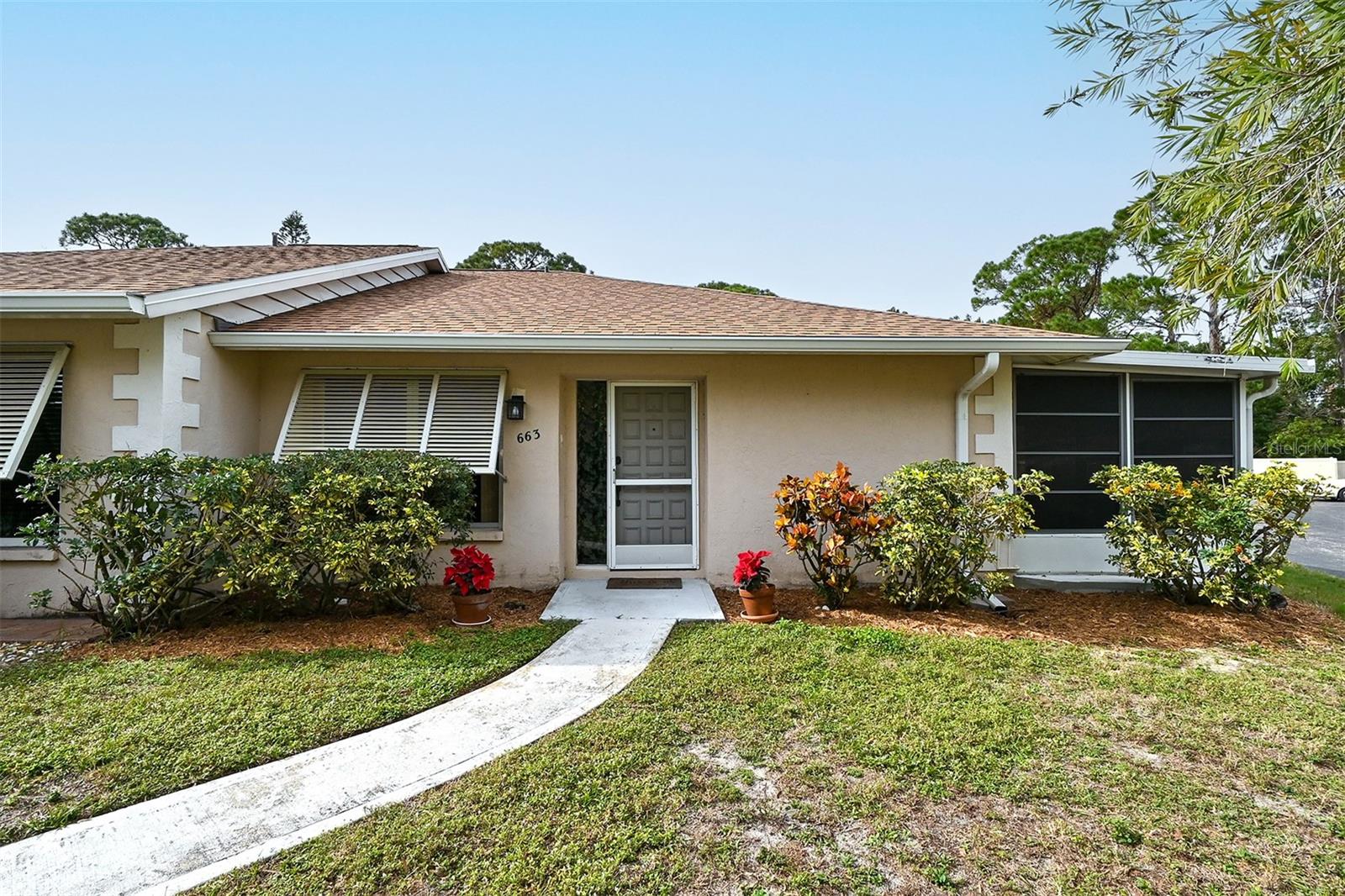 Welcome to this meticulously upgraded and maintained home, great location for this 2 bedroom, 2 bath attached Villa in Sarasota! This 936 sqft unit in Jefferson Pines is within steps of the community pool and a short drive downtown Sarasota. Where every detail has been thoughtfully considered for your comfort and modern living. In January 2021, the master bathroom shower was retiled, the installation of new cabinets in the kitchen featuring luxurious granite countertops and sliding glass door in the master bathroom. The plumbing was updated, and the kitchen appliances received a comprehensive facelift, including a brand-new, unused dishwasher. The popcorn ceiling was expertly removed throughout, replaced with a modern drop ceiling texture, Further, both bedrooms were adorned with stylish ceramic tiles, complementing the rest of the house's ceramic tile flooring installed around the same time. New faucets were added to the kitchen and bathroom sinks, as well as the master shower, ceiling fans throughout the home, with the exception of Lalani, providing comfort and energy efficiency. Simultaneously, the lighting was revamped, adding a contemporary touch to every corner of the house. The year 2022 brought more substantial improvements, with a new air conditioning system installed both inside and outside the home in April. In September 2022, a new water heater was installed, ensuring a reliable and efficient supply of hot water. capping off the list of updates, a brand-new roof was installed in November 2022, providing peace of mind and protection for years to come. The exterior of the condo will be pressure washed and freshly painted. Don't miss the opportunity to make this house your home! schedule a showing today!!
