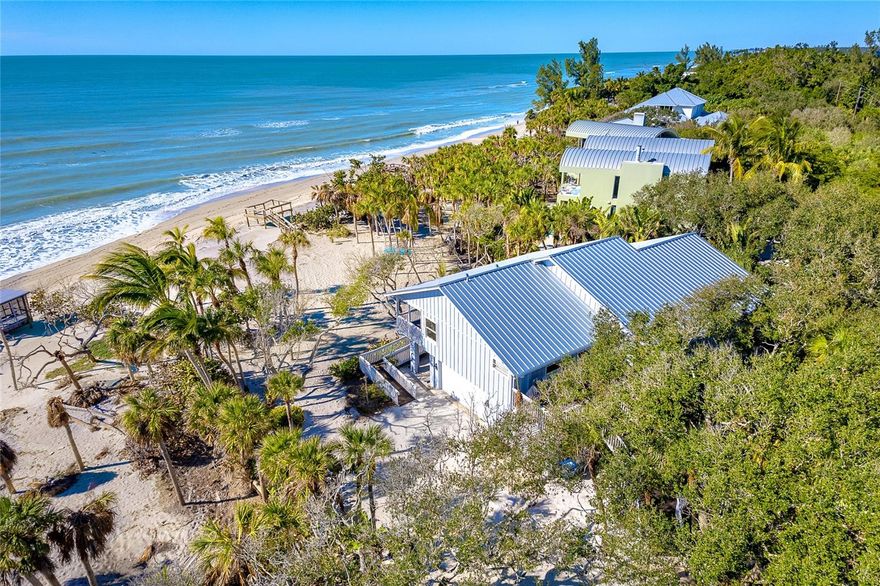 <p>Beachfront Oasis on Manasota Key - Your Tranquil Paradise</p>
<p>Nestled within the natural beauty of Manasota Key, Florida, lies an exceptional coastal estate, capturing the essence of luxurious beachfront living. This private retreat, located in Sarasota County, is situated on a 0.8421-acre lot with 125 feet of beach frontage. </p>
<p>The old Florida charm of Manasota Key’s designated canopy road leads you to the property’s lush vegetation and breathtaking gulf views. Oak trees and tropical palms grace the property, providing a peaceful, shaded sanctuary. 
<p>This 3-bed, 2 ½-bath home seamlessly blends indoor and outdoor living, immersing you in the coastal lifestyle. Wake to the sound of waves and seabirds from the master suite, with sliding glass doors opening onto the balcony and its stunning beach views. </p>
<p>At the heart of the home, discover a newly remodeled gourmet kitchen featuring stainless appliances and custom cabinetry. The spacious bar is ideal for entertaining family and friends. </p> 
<p>Living areas are thoughtfully designed with an open floor plan, boasting high ceilings and abundant natural light. Expansive windows and sliding glass doors connect the interior to the verdant lawn and magnificent Gulf of Mexico views. </p>
<p>On the ground level, a spacious garage provides ample room for vehicles and water toys. An air-conditioned game room/flex space offers endless possibilities for fun. This versatile area could be used for game tables, a quiet retreat, storage, or as overflow space for guests, ensuring their comfortable stay. </p>
<p>Outdoors, the allure of the Gulf of Mexico beckons. Stroll down the shell path through tropical foliage, shaded by coconut palms and sea grapes to your own sandy shoreline. Enjoy the day in a hammock with a good book, join your family for lawn games, or cast a line to the many snook, tarpon, and redfish that cruise the surf. Wrap up the day watching a spectacular sunset from the beachside deck. Moments spent from sunrise to sunset in this coastal haven become cherished memories. </p>
<p>This beachfront home invites you to experience the best of Florida's Gulf Coast. Seize this rare opportunity to own a piece of paradise. Contact us to embark on your journey to coastal enchantment today. </p>