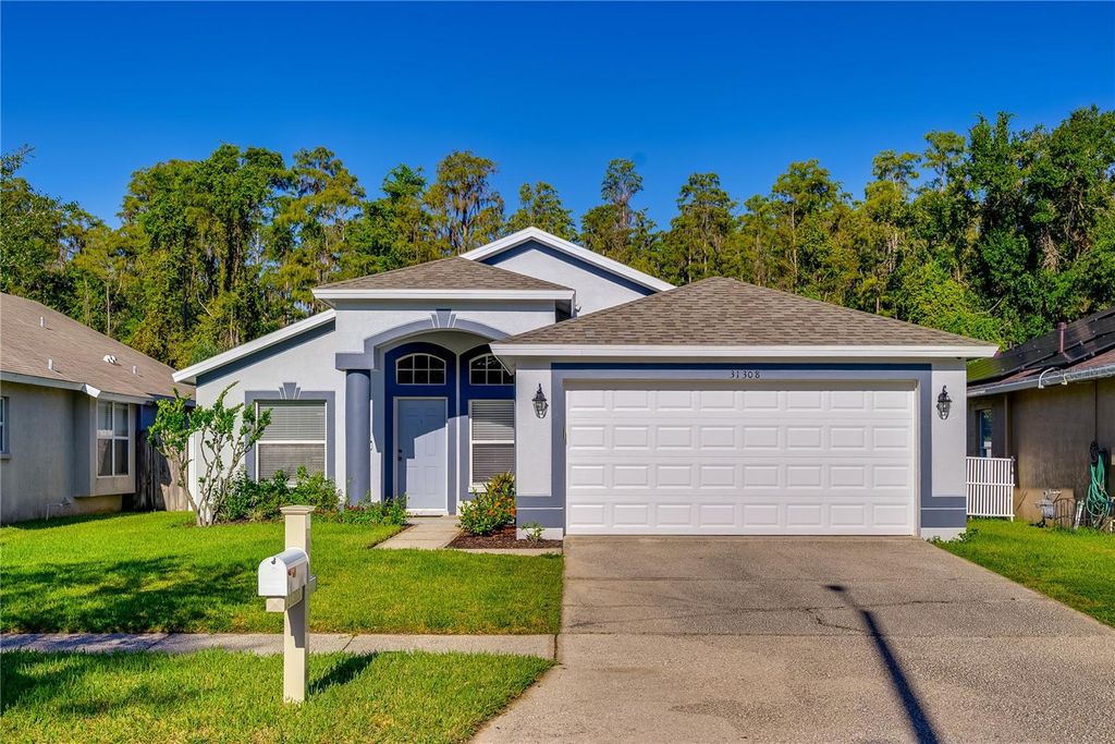 Photo of 31308 Wrencrest Drive, Wesley Chapel, FL 33543 (MLS # TB8425655)