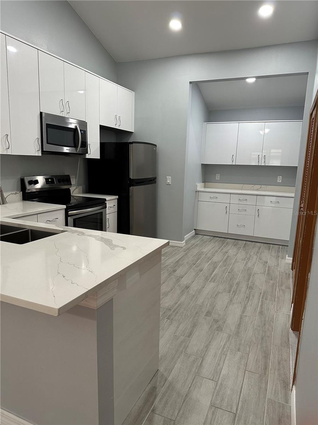 Photo of 7427 Spring Villas Circle, Orlando, FL 32819 (MLS # O6384198)