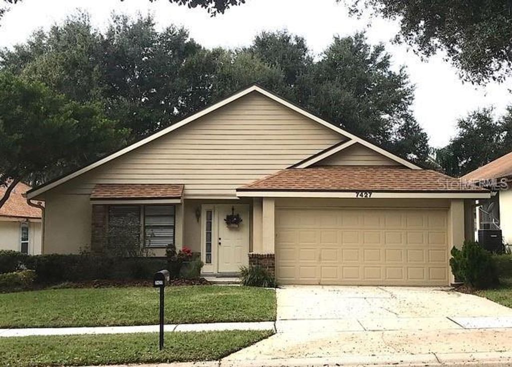 Photo of 7427 Spring Villas Circle, Orlando, FL 32819 (MLS # O6384198)