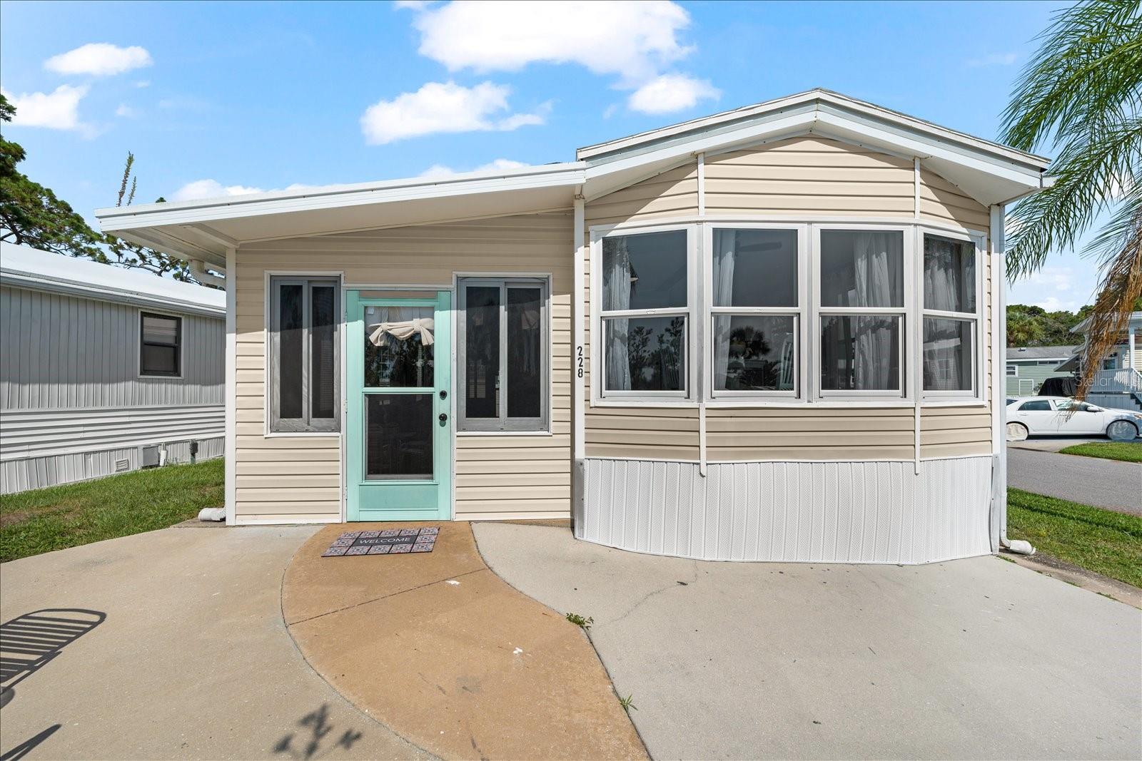 This FULLY renovated and UPDATED Nokomis home is now available! Being sold completely furnished and thoughtfully decorated, it is move in ready and located only a few miles away from the beautiful Nokomis Gulf beaches, golf courses, dining and shopping! This home features newer windows, a 2019 A/C unit, brand new stainless steel appliances, including a French door refrigerator with ice maker, a Bosch hidden pull out dishwasher for clean aesthetics, and newer full size stackable washer/dryer! Boasting tons of modern updates such as new Luxury vinyl plank flooring through out, UPDATED PLUMBING, ELECTRICAL, new 3/4" plywood sub flooring, NEW SHEET ROCK and paint, new trim & baseboards, lighting, ceiling fans, a beautifully tiled walk in shower, new bathroom vanity and closets feature wood finish storage organization! This kitchen & dining space is flooded with natural lighting and offers new cabinetry, tiled backsplash, pantry closet, and beautiful new butcher block countertops complimented with matching floating shelves and an over-sized deep sink! BONUS- NO FLOOD ZONE LOT, great for peace of mind! Paradise living for under $200k only moments to the beach, The Kings Gate Park is a great 55+ GATED COMMUNITY that offers a ton of amenities such as, pool, clubhouse, tennis courts, BOAT LAUNCH, optional storage yard and so much more! This home is the perfect location to retire, snow bird or enjoy the year round sunshine and Florida lifestyle here in SWFL. This home is fully equipped and has everything you need, pack your bags and schedule your showing today!