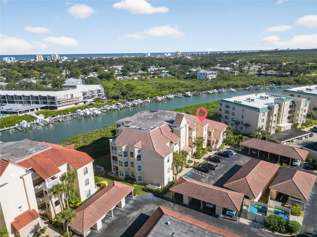 Photo of 434 Bouchelle Drive #304, New Smyrna Beach, FL 32169 (MLS # NS1086705)