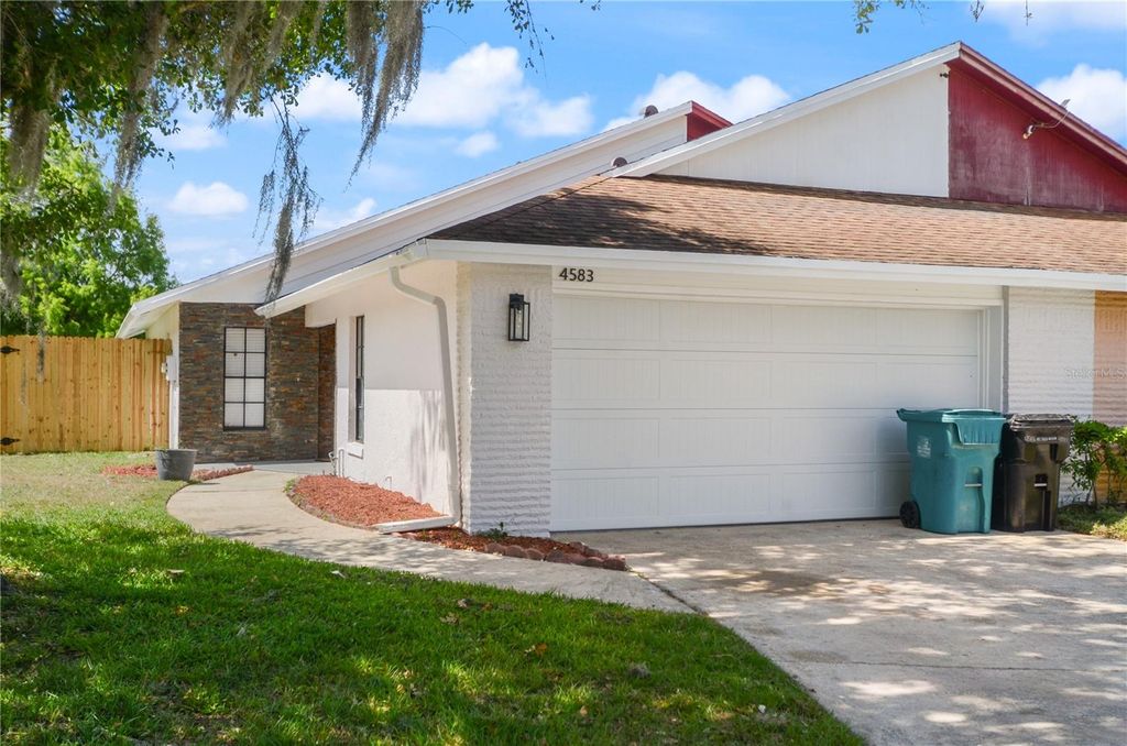 Photo of 4583 Heritage Oak Drive, Orlando, FL 32808 (MLS # O6401937)