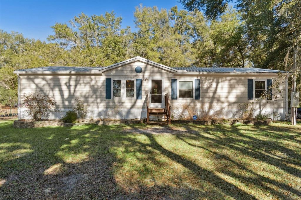 Photo of 10931 NE 95th St, Archer, FL 32618 (MLS # OM715476)
