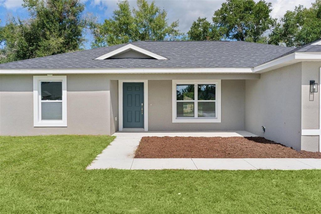 Photo of 194 Malauka Run, Ocklawaha, FL 32179 (MLS # G5117431)