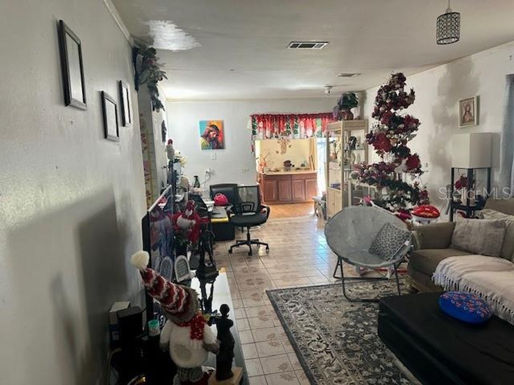 Photo of 7025 Parliament Drive, Tampa, FL 33619 (MLS # TB8459249)