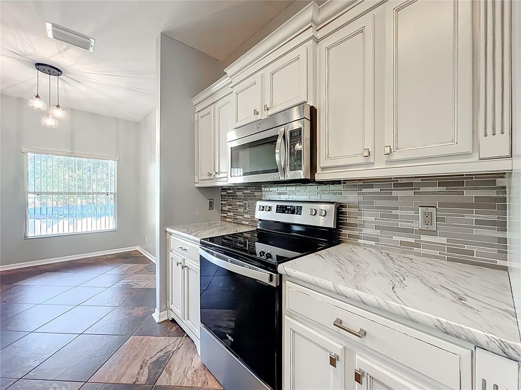 Photo of 12805 SW 64th Lane, Ocala, FL 34481 (MLS # OM712207)