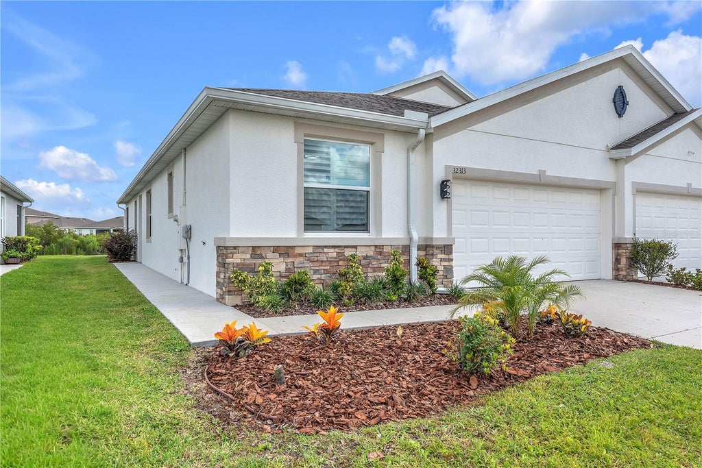 Photo of 32313 Lexington Street, Wesley Chapel, FL 33543 (MLS # TB8518078)