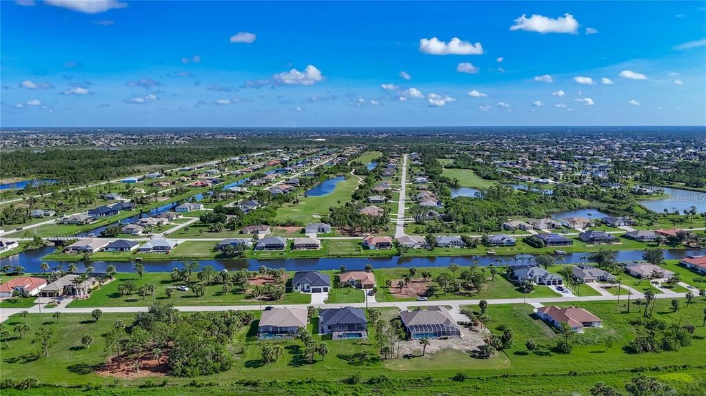 Photo of 1167 Boundary Boulevard, Rotonda West, FL 33947 (MLS # C7523442)