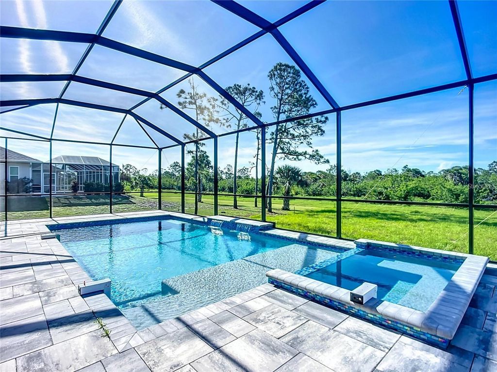 Photo of 1167 Boundary Boulevard, Rotonda West, FL 33947 (MLS # C7523442)