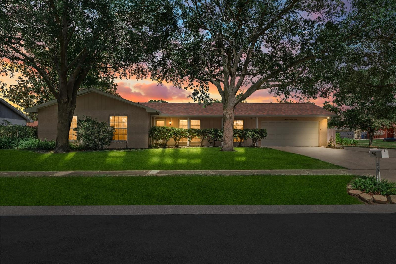 Welcome to 1807 Green Lawn Street—a beautifully updated 4-bedroom, 2-bathroom residence situated on an expansive, elevated .29-acre corner lot in one of Brandon’s most established and desirable neighborhoods. Offering outstanding curb appeal, mature landscaping, and a newer wood privacy fence, this home is a rare blend of comfort, functionality, and location—complete with a sparkling in-ground pool that’s ready for summer enjoyment. Meticulously prepared for market, the home features a brand-new roof (2023), fresh interior paint, and brand-new stainless steel kitchen appliances, ensuring peace of mind and modern appeal. Inside, you'll find an open and versatile layout, including a massive formal living room, a spacious family room just off the kitchen with direct access to the screened porch and pool, and plenty of flexible space for entertaining, relaxing, or working from home. The interior showcases a timeless combination of light oak hardwood floors and ceramic tile, creating a warm and inviting atmosphere that’s both elegant and low-maintenance. The primary suite is a relaxing retreat, offering a large footprint, a walk-in closet, and a private en suite with a step-in shower, updated vanity, and refined finishes. Three additional bedrooms are generously sized and share an upgraded hall bath with a shower/tub combo—ideal for guests, family, or home office use. Outdoors, enjoy Florida living at its finest with a screened lanai that opens to the sun-drenched pool deck—perfect for weekend barbecues, lounging, or hosting gatherings. The oversized fenced yard offers room for pets, play, or even future expansions, all while enjoying the peace of a non-flood zone setting. Positioned in close proximity to Booker T. Washington Elementary School and the popular Saladino Park, the location offers the perfect balance of family-friendly amenities and convenience. Nearby, residents will find abundant shopping, dining, and services along Brandon Boulevard and easy access to I-75, I-4, and the Selmon Expressway. Why Brandon? Brandon is one of the Tampa Bay area’s most vibrant suburban communities, known for its top-rated schools, expansive park system, and proximity to downtown Tampa. Just 20 minutes from downtown Tampa, 25 minutes from Tampa International Airport, and less than an hour from world-class Gulf Coast beaches, Brandon offers the perfect blend of suburban serenity and urban access. The area continues to grow in value and appeal, making it a smart choice for both homeowners and investors alike. Don’t miss your chance to own a move-in-ready pool home with rare outdoor space and thoughtful upgrades in one of the most convenient locations in the region. Schedule your private tour of 1807 Green Lawn Street today—homes of this caliber don’t stay on the market for long.