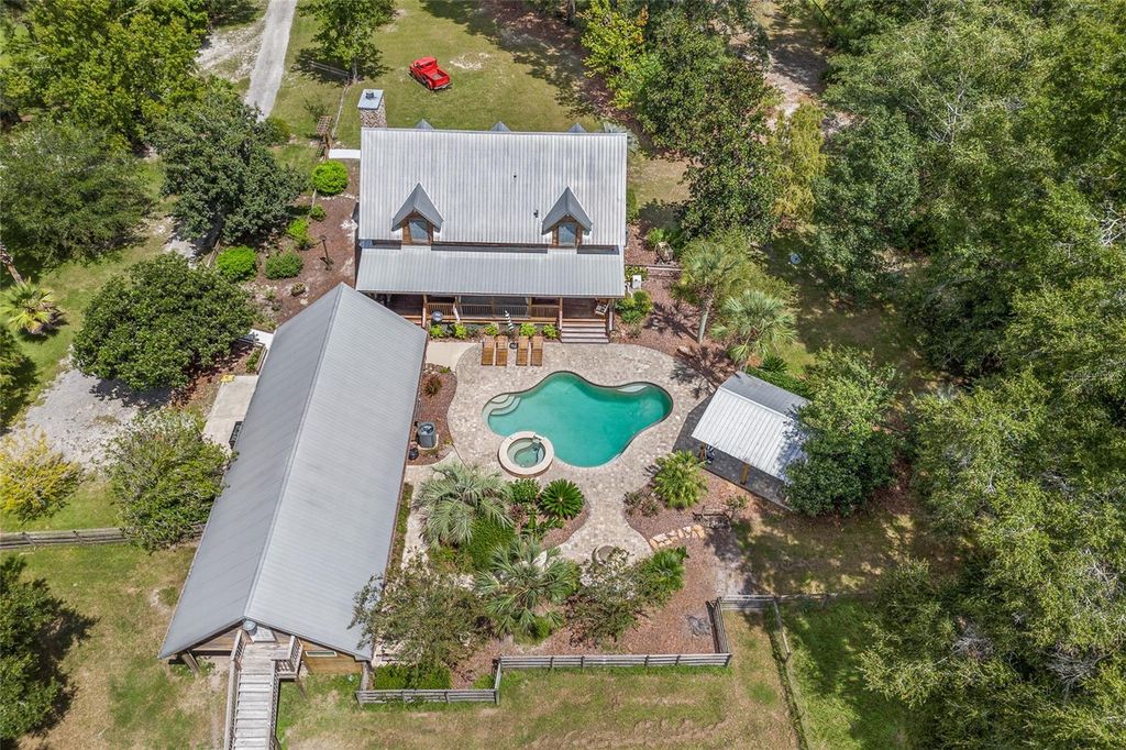 Photo of 25743 NW 62nd Avenue, High Springs, FL 32643 (MLS # GC539110)