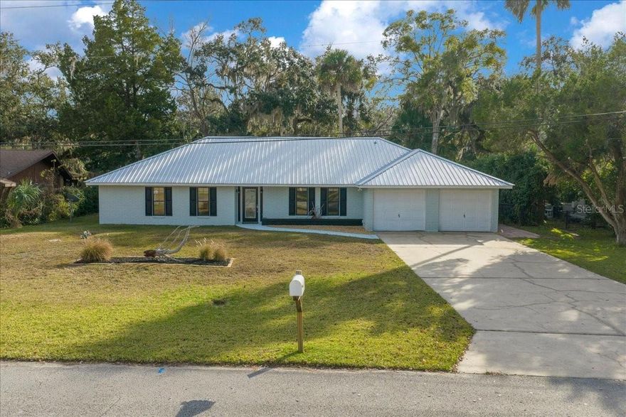 Discover the perfect blend of comfort, adventure, and peace of mind in this beautifully updated 3-bedroom, 2-bath waterfront home that has NEVER flooded and features a metal roof installed in 2022.. Perfectly positioned on a true deep-water canal with direct access to the Withlacoochee River, the Gulf and multiple Florida Springs. Enjoy serene water views where manatees and dolphins are frequent visitors.
Inside, the charming interior offers a comfortable and functional layout with new flooring, updated bathrooms, and a modern kitchen, making it perfect for everyday living or entertaining guests. This elevated home also has a spacious two-car garage with plenty of room for vehicles and water toys.  
Outside, you’ll find an expansive multi-level dock, featuring a large fixed dock for entertaining plus a floating dock for easy boat access. Plus a fully fenced backyard perfect for gatherings, along with a shed for tools and gear. Best of all, NO HOA, giving you the freedom to enjoy the property your way.
Whether you’re searching for a full-time residence, seasonal getaway, or high-potential rental investment, this waterfront gem checks every box. Located just minutes from the Gulf, Crystal River, manatee tours, and some of Florida’s most beautiful springs.
Waterfront living, boating, kayaking, paddleboarding, fishing, waterskiing, and scalloping, this riverside retreat truly offers it all. Don’t miss the opportunity to make it yours.