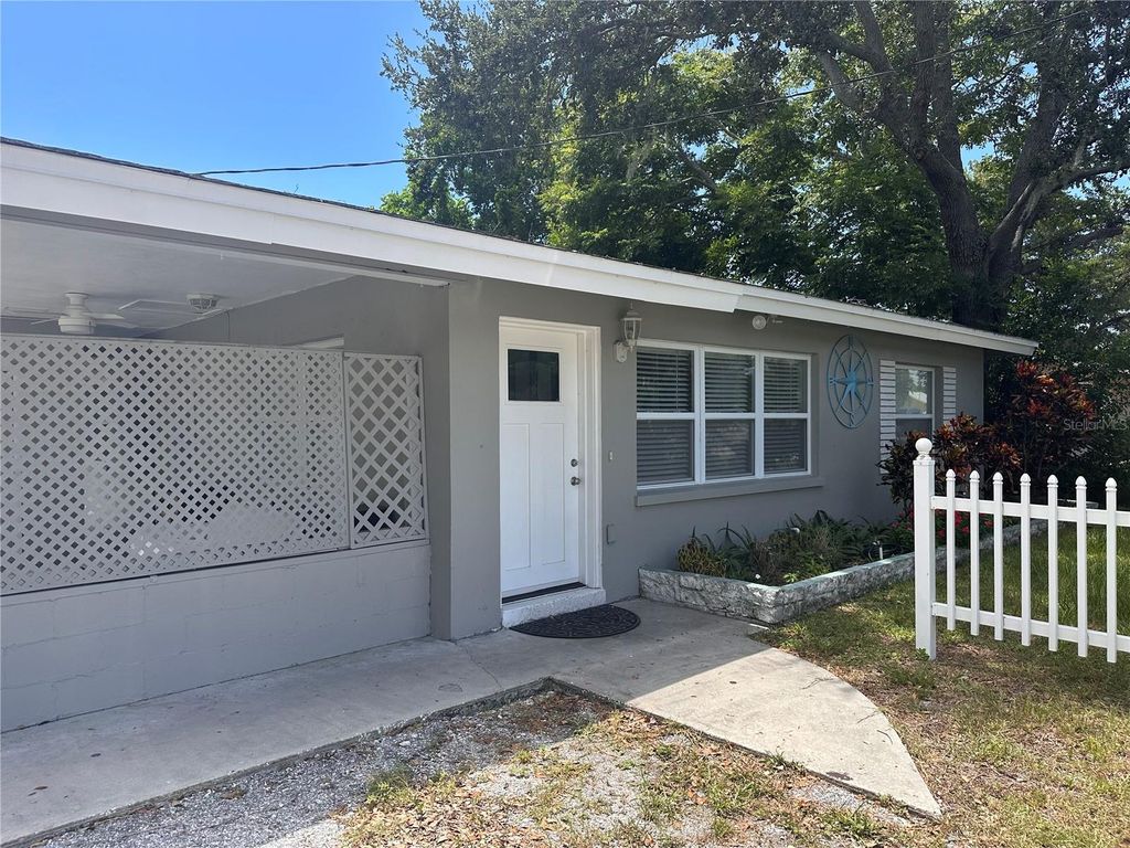 Photo of 2261 Curlew Road, Dunedin, FL 34698 (MLS # TB8420996)