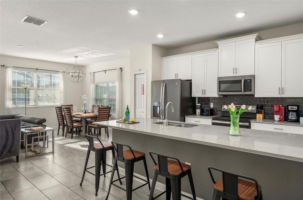 Photo of 8934 Stinger Drive, Davenport, FL 33896 (MLS # O6402715)