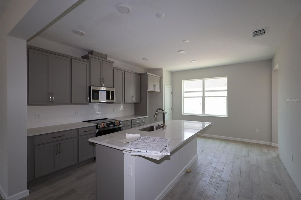 Photo of 1402 Mount Royal Drive, Saint Cloud, FL 34771 (MLS # O6397886)