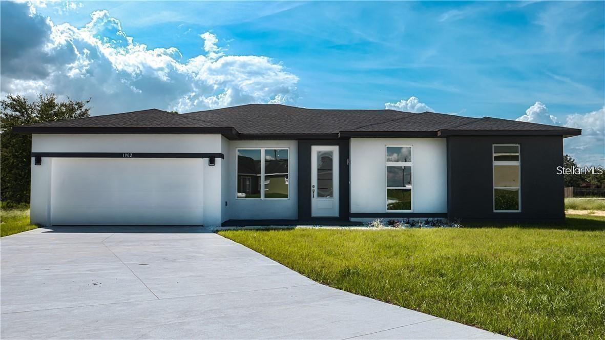 AWESOME CONTEMPORARY HOUSE WITH AN AMAZING KITCHEN WITH GRANITE COUNTERTOP, TILE IN ALL HOUSE, STAINLESS STEEL APPLIANCES INCLUDED, HUGE LOT. YOU GOT TO COME AND SEE IT TODAY.