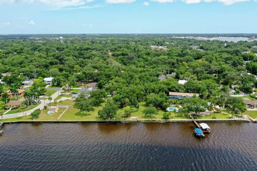 A vacant lot 0.284 acres (12,371 sf) at a very special location - The Manatee River with views. Partial ownership of a 1.6 acre private park attached and bordering the property with riparian rights and a small launch. Lot has been cleared, fill has been brought in, meters and back-flow preventers installed. Ready to build. Leading architectural firm customized plans/designs for the property are  available. Owner financing available.
