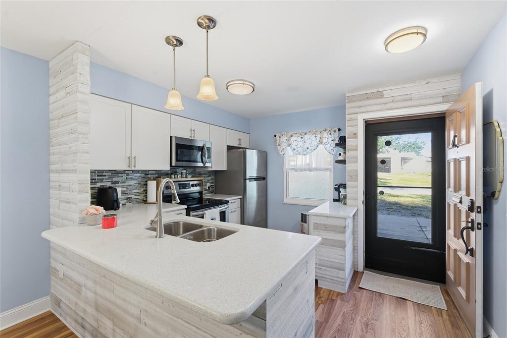 Photo of 2935 Feather Drive #65-D, Clearwater, FL 33759 (MLS # TB8547188)