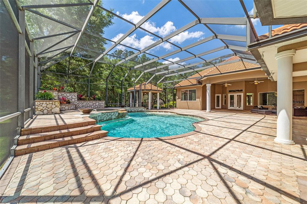 Photo of 2380 SE 73rd Loop, Ocala, FL 34480 (MLS # OM721435)