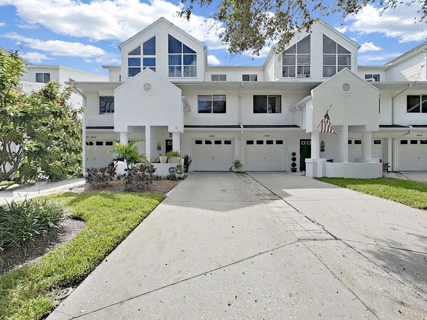 Welcome to Tara Cay, a serene waterfront community offering the perfect blend of coastal charm and modern convenience. This spacious 4-bedroom, 4-bath townhome with a 1-car garage provides flexible living options ideal for multi-generational families, guests, or a home office/game room setup.  Step inside to discover an inviting open-concept floor plan with textured ceilings, ceiling fans throughout, and abundant natural light that enhance the home’s comfortable, stylish atmosphere. Enjoy two private screened outdoor retreats—a balcony off the main living area and a ground-level lanai, perfect for relaxing or entertaining.  The first-floor bedroom with an ensuite bath and lanai access offers privacy and versatility, making it perfect for guests or in-laws. Upstairs, the primary suite impresses with cathedral ceilings, dual walk-in closets, and an ensuite bath with accessibility features for added comfort.  Tara Cay is known for its lush, park-like setting and low HOA fees, which include water, sewer, trash, cable, ground maintenance, a heated community pool, and access to 24-hour community docks for kayaking, canoeing, or paddleboarding. The neighborhood also hosts regular social events, creating a friendly, welcoming atmosphere.  Ideally located  just minutes from shopping and dining, 10 minutes to world-famous top rated beaches, and within 30 minutes to downtown St. Pete and both major airports.  Don’t miss your chance to live in one of Seminole’s premier waterfront communities—schedule your private showing today!