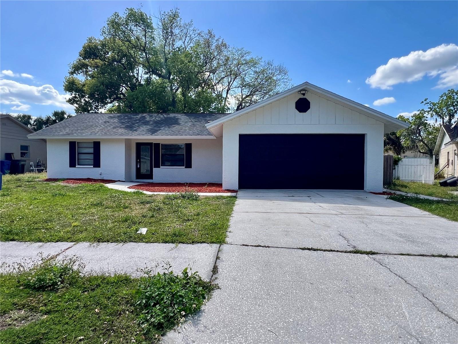 WELCOME TO THIS SPECTACULAR single-story 3-bedroom, 2-bathroom home for rent in Lutz, Florida! This remodeled property in the heart of Lutz, FL, features 3 bedrooms and two modern bathrooms remodeled with total comfort for you and your family. It has new stainless steel appliances and a large garage to keep your vehicle shaded. ENJOY A BEAUTIFUL PRIVATE PATIO perfect for family gatherings, barbecues, or just relaxing outdoors. Need additional storage space? We've got you covered with a storage shed in the backyard. Fresh paint for the interior! Tenants are responsible for all utilities (water, electricity, etc.). First month's rent plus a security deposit equal to the rent amount is required. Renters insurance is required. This property complies with a no-smoking policy. This home offers privacy and tranquility just minutes from the freeway, shopping, restaurants, and top-rated schools. Don't miss this opportunity to make this charming rental home yours. CALL TODAY FOR A PRIVATE SHOWING!