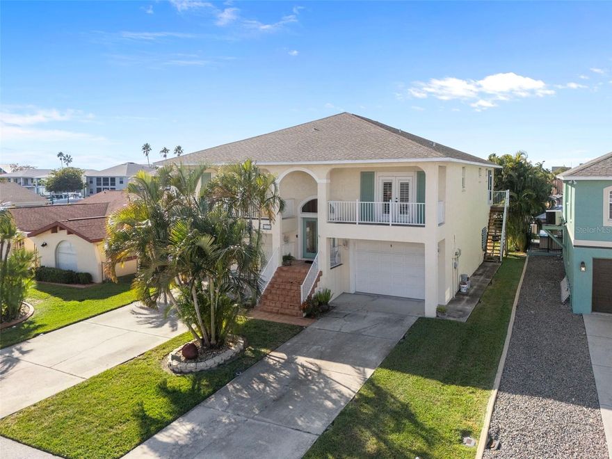 WATERFRONT PARADISE IN SEA PINES PRESERVES - HUDSON'S PREMIER BOATING COMMUNITY-

Discover coastal living at its finest in this exceptional 3-bedroom, 2-bath elevated waterfront home on a deep water canal with direct Gulf of America access. This meticulously maintained concrete block construction residence offers the perfect blend of luxury, functionality, and Florida lifestyle.

STUNNING WATER VIEWS & OUTDOOR LIVING-
Enjoy breathtaking sunsets from your expansive screened porch, seamlessly connected to the living room, dining room, and kitchen. The primary suite features elegant French doors opening to the porch, plus a spa-like en suite bath with separate tub, shower, water closet, and dual vanities. Both guest bedrooms boast French doors leading to private covered balconies—perfect for morning coffee with the sunrise.

BOATER'S DREAM-
Your private deep water canal comes complete with a boat lift, concrete seawall, and floating dock. Enjoy bridge-free access to the open Gulf via a US Coast Guard marked channel—just 15 minutes by boat! Reach the crystal-clear waters of Anclote/Aripeka Springs in minutes. Nestled on a quiet cul-de-sac overlooking coastal wetlands and a wildlife/bird sanctuary along Florida's Nature Coast.

QUALITY CONSTRUCTION & RECENT UPGRADES-
• Elevated design with oversized garage on first level
• Solid concrete block construction throughout
• Brand new A/C ductwork for optimal efficiency
• New impact-resistant glass French doors in garage
• Hurricane shutters for peace of mind
• Beautiful solid wood floors throughout
• Crown moulding adding elegant detail
• Decorative exterior shutters enhancing curb appeal

CHEF'S KITCHEN-
Granite countertops, stainless steel appliances, and open-concept design make entertaining a breeze.

COMMUNITY AMENITIES-
Sea Pines offers two parks, clubhouse, private boat ramp, and optional civic association. This deed-restricted community ensures your investment is protected.

UNBEATABLE LOCATION-
• Minutes to Sun West Park and Weeki Wachee Springs
• Easy access to I-75 and SR-589 Suncoast Parkway via SR-50 and SR-52
• 1 hour to Tampa International Airport
• 90 minutes to Orlando theme park attractions

--This is more than a home—it's a lifestyle. Experience the tranquility of nature, the thrill of boating, and the comfort of modern luxury. Don't miss this rare opportunity to own a piece of Florida's Nature Coast!